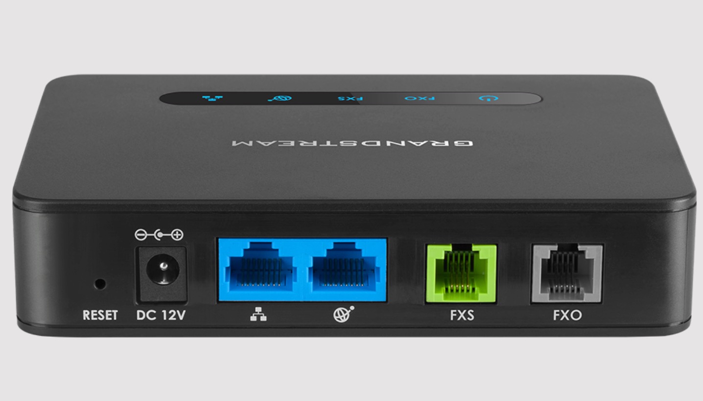 Wireless router Netgear Nighthawk R7000 with two Ethernet ports for wired connections.